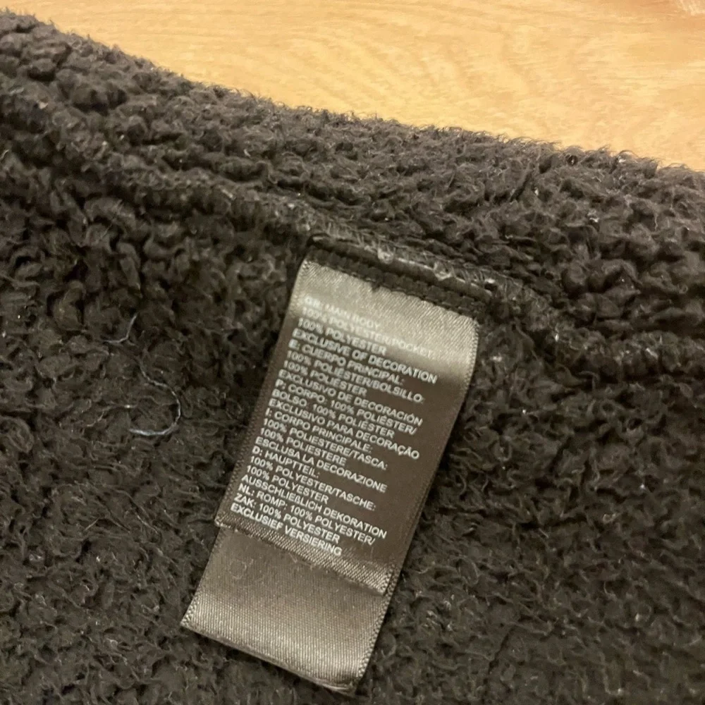 The North Face Black Sherpa Vest, size medium